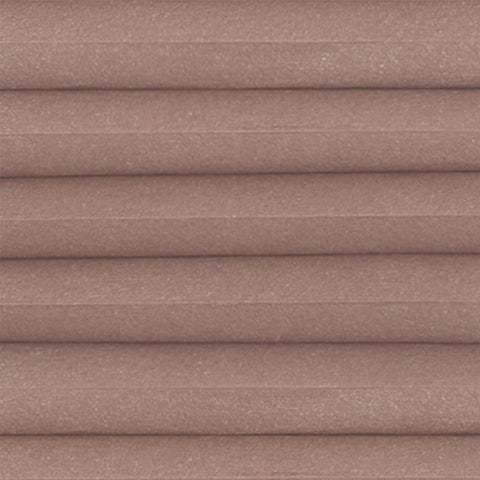 Halo Soft Damson close up. A light filtering pink/red cellular fabric, perfect for windows and Bi-fold Doors. Providing Shade and Energy efficiency.