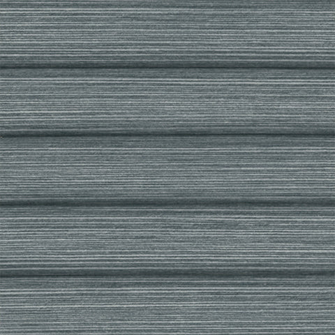 Mirage Marine Blackout Honeycomb pleated blind close up, Energy efficient thermal cells in a marine blue shade with a horizontal line texture.
