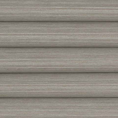 A close-up of a Blackout Honeycomb pleated blind, Mirage Mocha. horizontal Texture with a light brown colour.