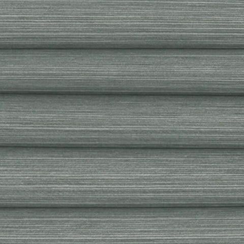 Mirage Blackout grey shadow pleated honeycomb roof blind, energy efficient cells with a striped pattern.