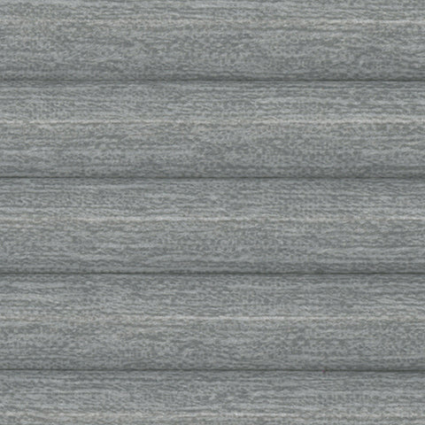 Close up of a Grey textured Blackout Honeycomb blind, Fresco Soft Pewter. The Cellular Blind is perfect for BI-fold Doors proving Thermal for energy saving and blocking out light.