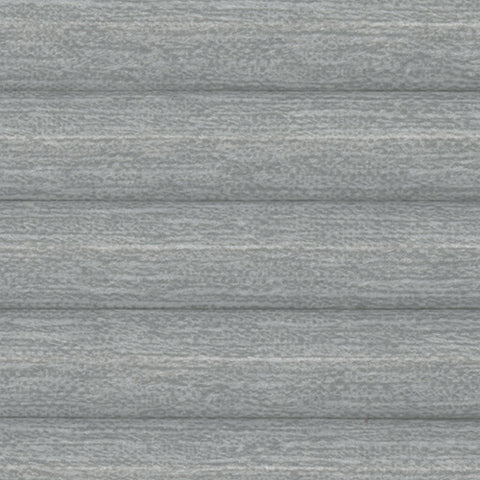 Fresco Light Filtering Pale Grey fabric close up from a Bi-Fold Door pleated blind. Thermal efficient Honeycomb cellular blind for energy saving
