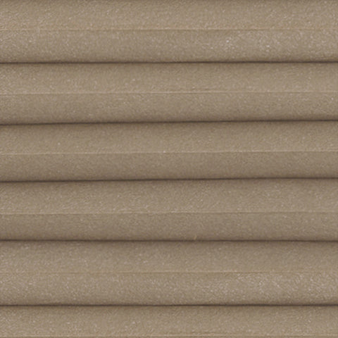 Halo Praline, a Light Filtering fabric close up from a Bi-Fold Door pleated blind. Thermal efficient Honeycomb cellular blind for energy saving and reduce glare