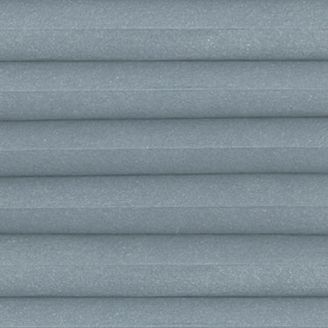 Halo Light Filtering Sea Mist fabric close up from a Bi-Fold Door pleated blind. A Blue thermal efficient Honeycomb cellular blind for energy saving