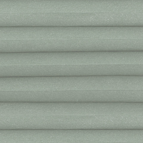 Close up of Halo willow, a solid Green Pleated Honeycomb Blind perfect for Bi-Fold doors.
