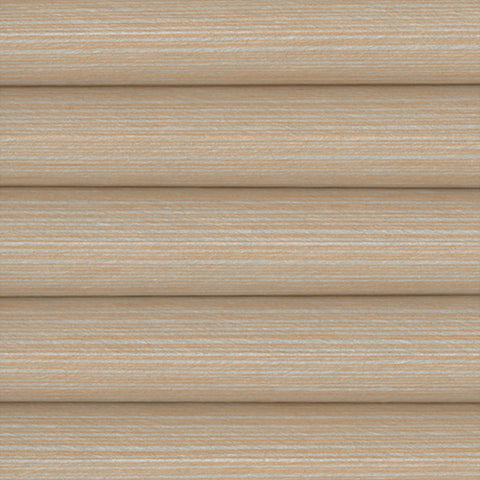 A close-up of a Honeycomb Pleated blind in Mirage Blackout Straw. A beige woven fabric with horizontal stripes. 