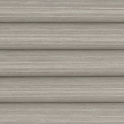 Close-up of Mirage Mushroom Honeycomb pleated translucent Blind , a light brown colour with horizontal lines.
